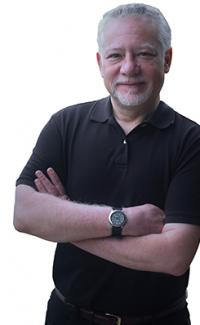 Kevin Patton leaning on a vertical surface