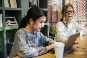 women working on laptop