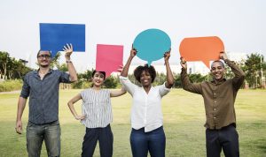 several people holding question bubbles above their heads